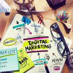 Office Desk with Tools and Notes About Digital Marketing Office Desk with Tools and Notes About Digital Marketing
